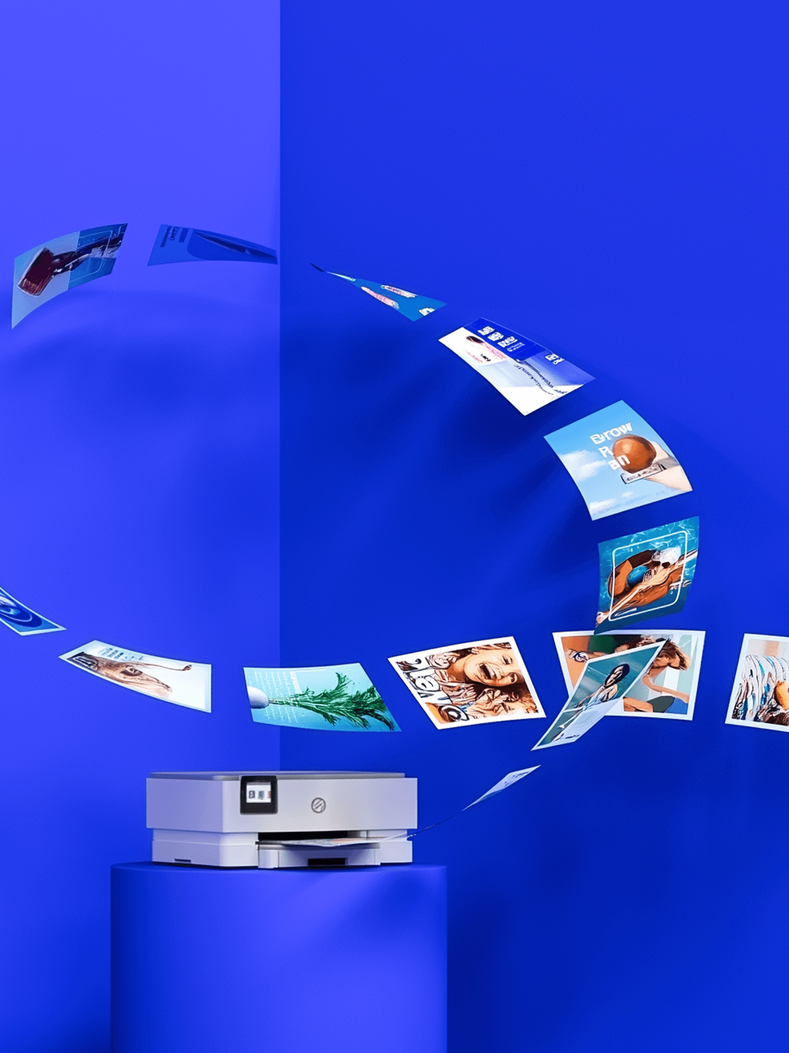A white printer sits on a blue pedestal against a bright blue wall, with colorful photos orbiting in a curved arc around it.