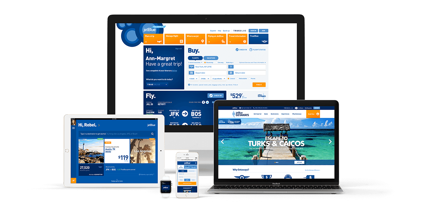 Group of devices (desktop, laptop, tablet, smartphone, and smartwatch) displaying the blue JetBlue travel site with flight search and vacation content.