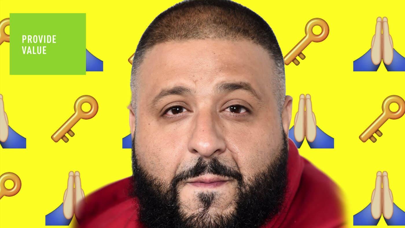 Person with a short buzz cut and beard in a red hoodie, against a bright yellow background with emoji keys and praying hands, plus a PROVIDE VALUE card