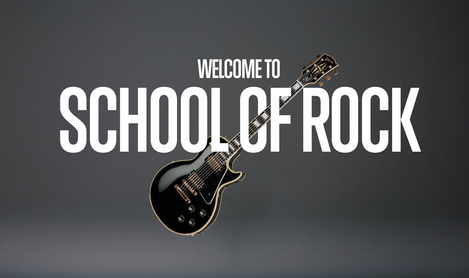 Dark grey gradient background with bold white text "SCHOOL OF ROCK"; a black electric guitar diagonally crosses the words, "WELCOME TO" above.