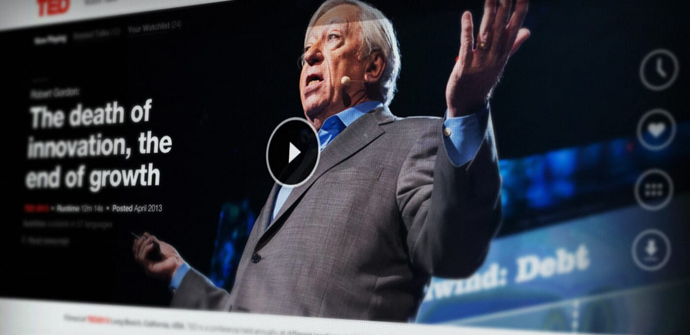 Presenter in a gray suit on a dark stage, with a circular play button overlay and the headline The death of innovation, the end of growth.